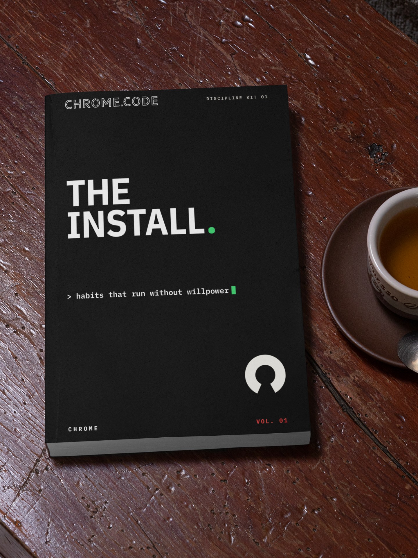 THE INSTALL on a wooden table next to an espresso
